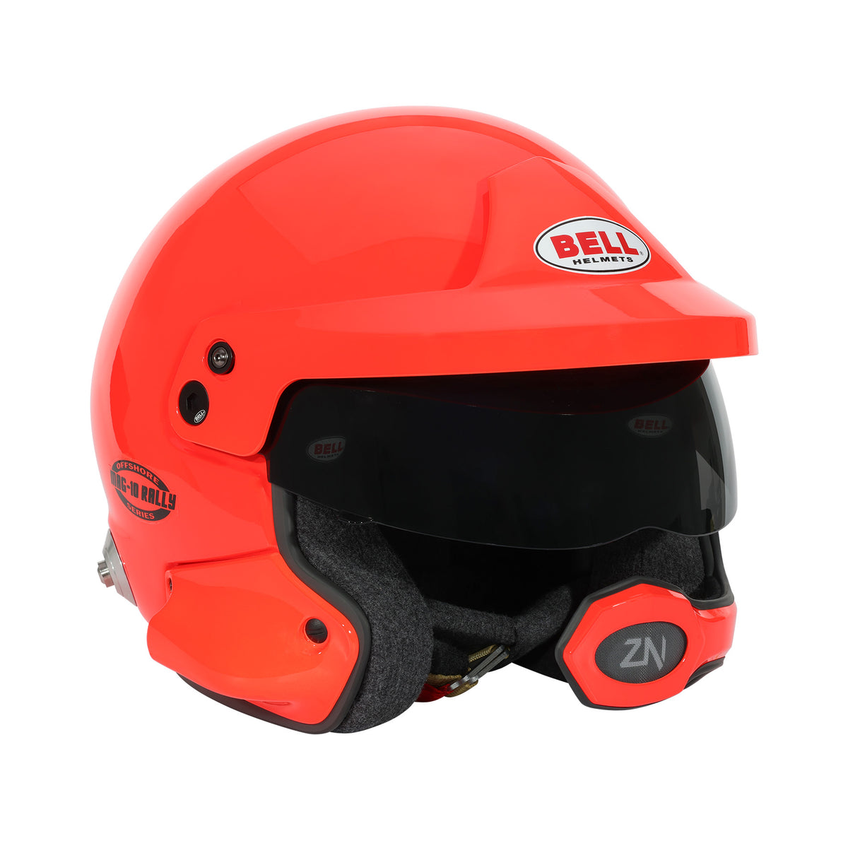 Bell MAG-10 Pro Rally helmet in Orange, right-front profile showing chin bar attachment point and visor edge